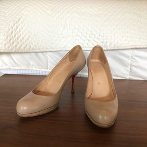 Christian Louboutin Round Toe Pumps
